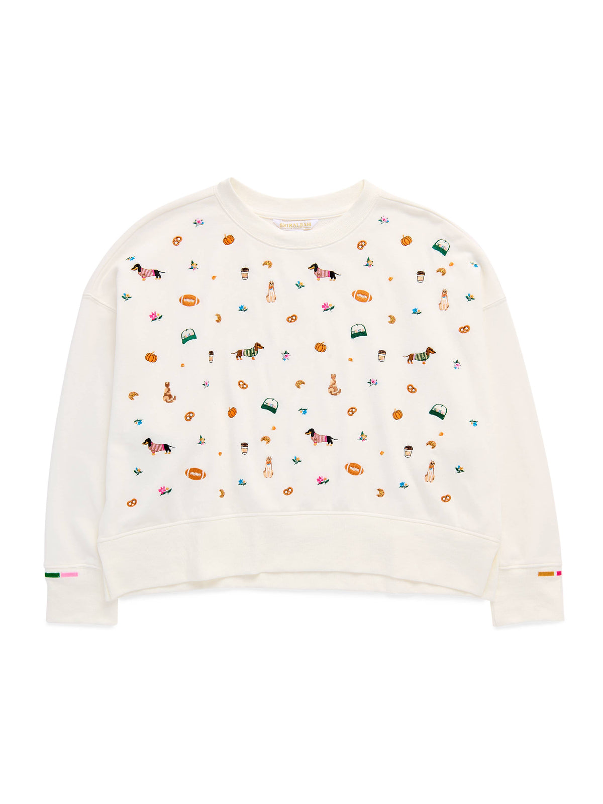 An off-white cropped crewneck sweatshirt featuring a colorful all-over print of equestrian-themed illustrations, including horses, bits, and riding gear, displayed on a clean white background.