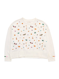 An off-white cropped crewneck sweatshirt featuring a colorful all-over print of equestrian-themed illustrations, including horses, bits, and riding gear, displayed on a clean white background.