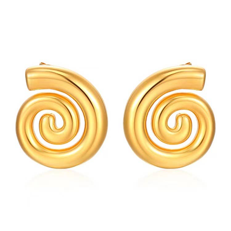 Pair of gold spiral earrings on a white background