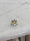 Stack of three rings on a marble surface
