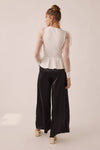 The Graceful Whisper Top